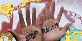 Stop Racism Hände mit der Aufschrift Stop Racism