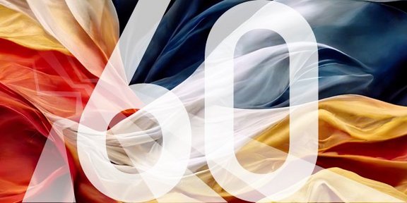 Zahl 60 vor deutscher und französischer Flagge