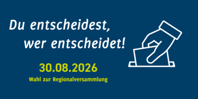 Icon einer Wahlurne mit dem Slogan "Du entscheidest, wer entscheidet" und dem Text "30.08.2026 Wahl zur Regionalversammlung"